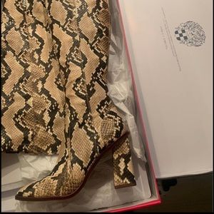 Over the knee snake skin boot